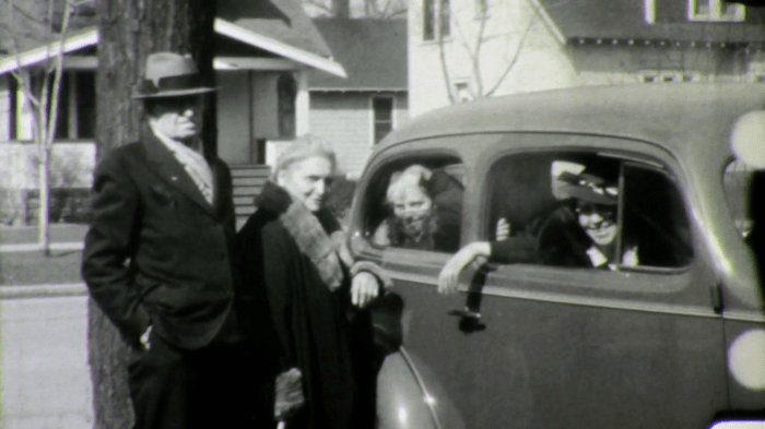 grandchildren-kids-waving-bye-goodbye-grandpa-and-grandma-1940s-vintage-film-home-movie-1628_hdbsgn68__F0007